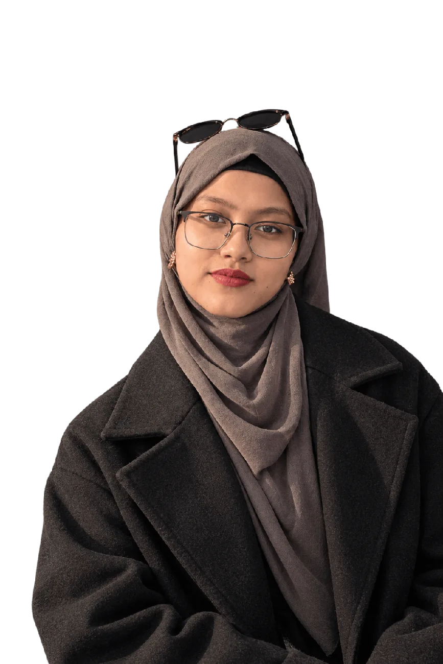 Mahbuba Saniya in a dark coat and taupe hijab